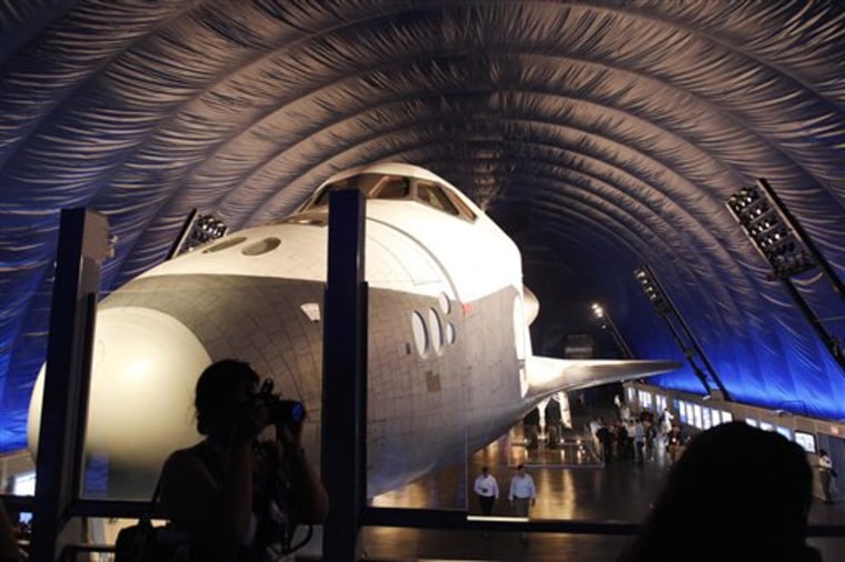 The Space Shuttle Enterprise sits on display at the Sea, Air and Space Museum's Space Shuttle Pavilion Wednesday, July 18, 2012, in New York.  The Pavilion will be open to the public Thursday, July 19, 2012. (AP Photo/Frank Franklin II)